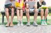 Students reading outdoors
